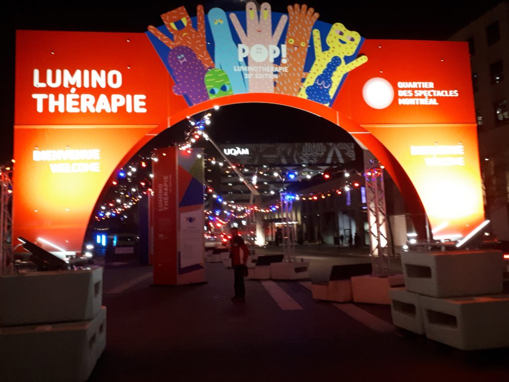 the entrance gate, to the LuminoThérapie public lightshow festival site