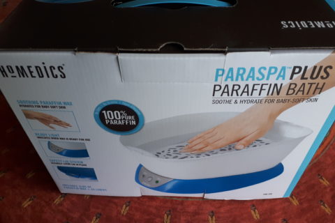 a home-use paraffin wax unit, just large enough to dip one's hand into hot wax