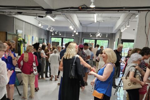 The crowd at the opening night Vernissage of the summer 2024 art show of Artists in Montréal, at the Galerie BOA Gallery in Old Montréal