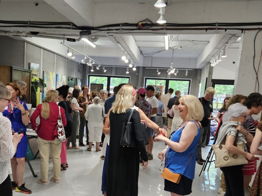 The crowd at the opening night Vernissage of the summer 2024 art show of Artists in Montréal, at the Galerie BOA Gallery in Old Montréal