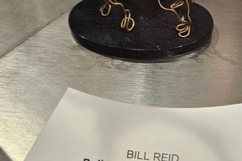 Photo of a gold-wire "doodle" of a bull, by Bill Reid, 1986